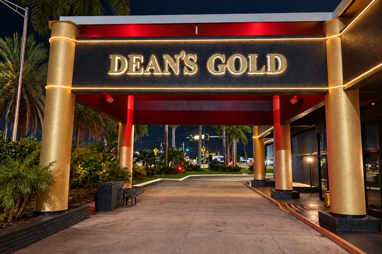 The clear, illuminated Dean’s Gold arrival entrance.